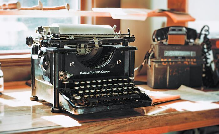 Old Typewriter On The Table 