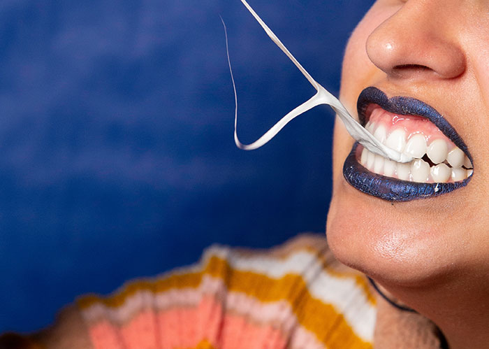 Women eating chewing gum