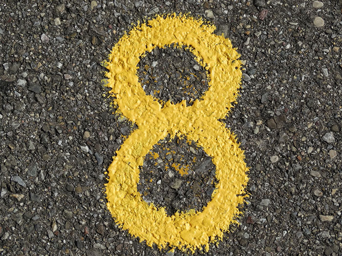 Number 8 painted on the road