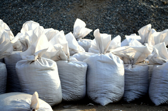 Multiple sand bags on the ground