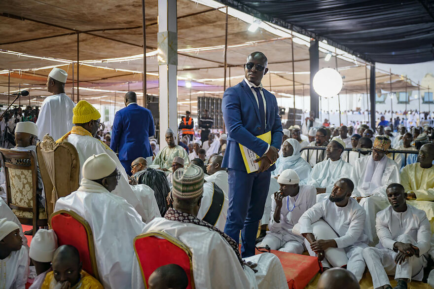 "Bodyguards Protect A Minister Speaking To The Layene Community"