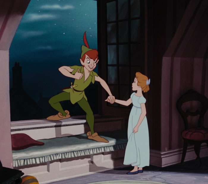 Peter Pan holding hand of children