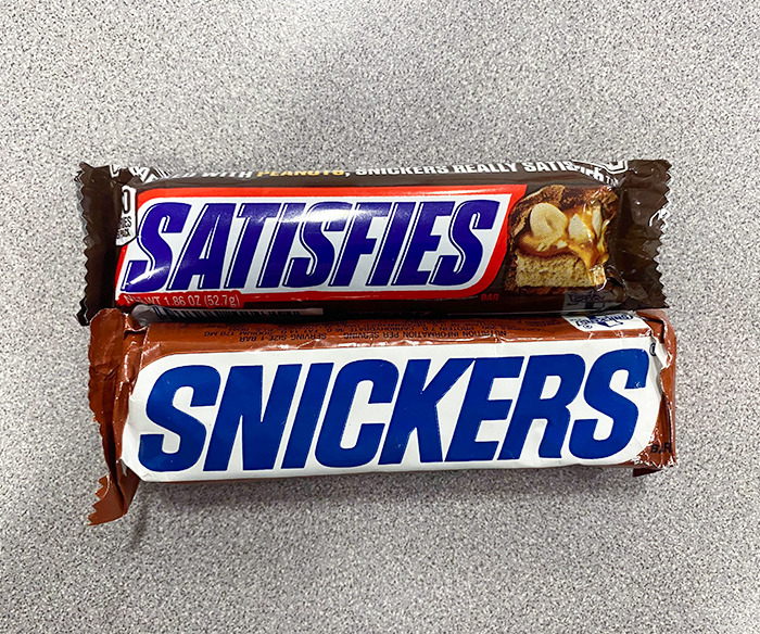 The Size Of A Snickers Bar From The 1980s vs. One Bought Now