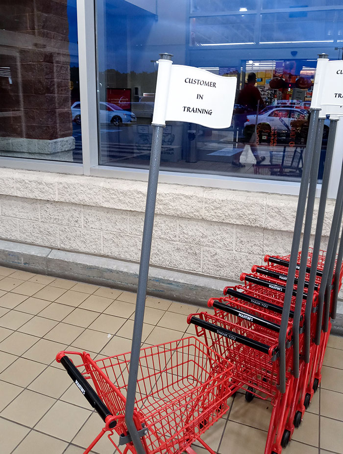A Child-Sized Shopping Cart At A Major Grocery Store
