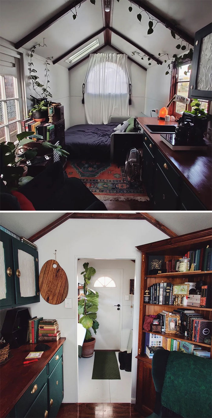 Cozy tiny house kitchen featuring green cabinets with wooden countertop and a compact living space filled with plants.
