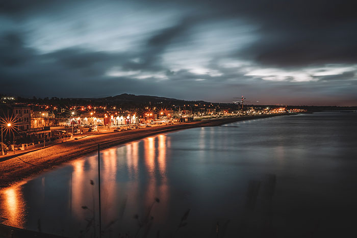 City at night near sea in Bray Ireland