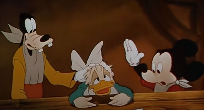 Donald Duck, Mickey Mouse, Goofy at the table 