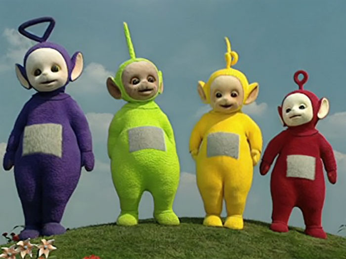 All four Teletubbies on the hill 