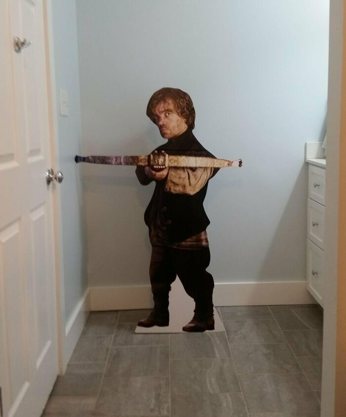 Tyrion Lannister carton figure holding a crossbow 