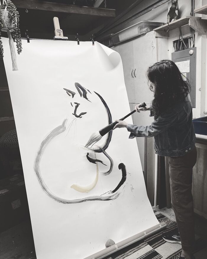 Giant Cat Art With A Giant Calligraphy Brush (4 Pics)