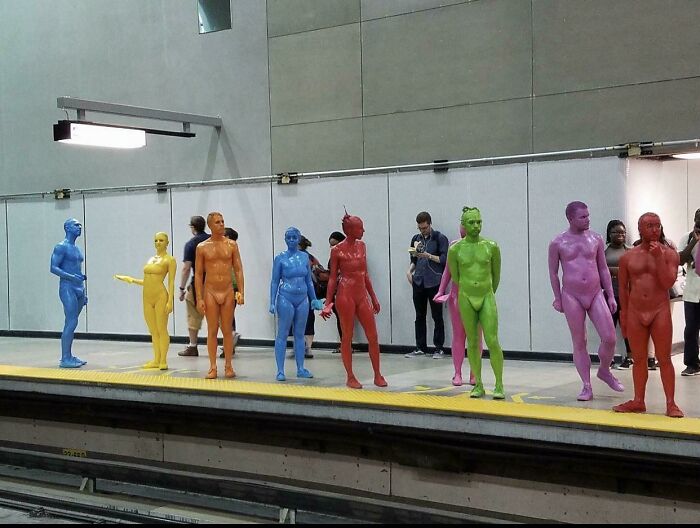 This Group Of Colorful Humans Waiting For A Train In Montreal