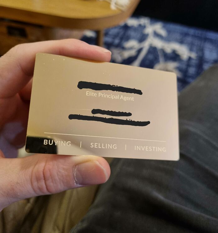 My Real Estate Agent Has Gold Metal Business Cards
