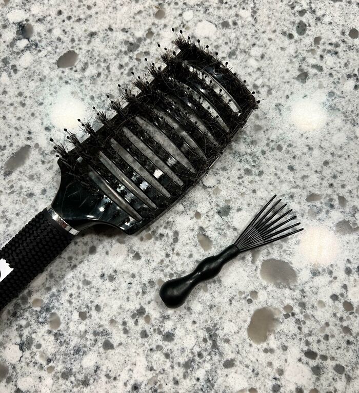 A Mini Brush That Came With My Daughter's Brush Set To Remove Built-Up Hair
