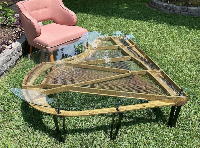 Coffee table made from a piano in the backyard 