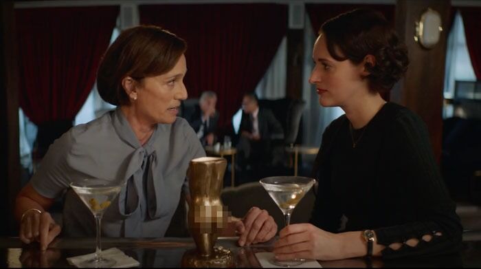 Belinda drinking and talking with Fleabag