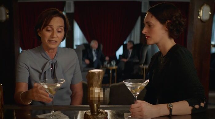 Belinda drinking and talking with Fleabag