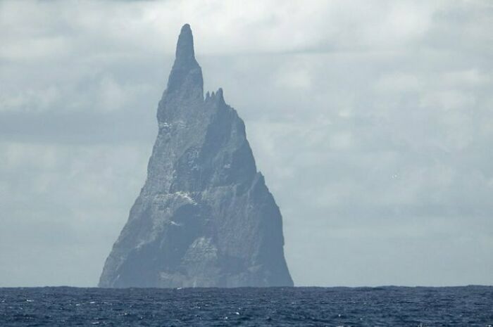 Ball's Pyramid Is A Volcano In Australia. Imagine Falling Off A Boat And Swimminf Towards It In The Distance