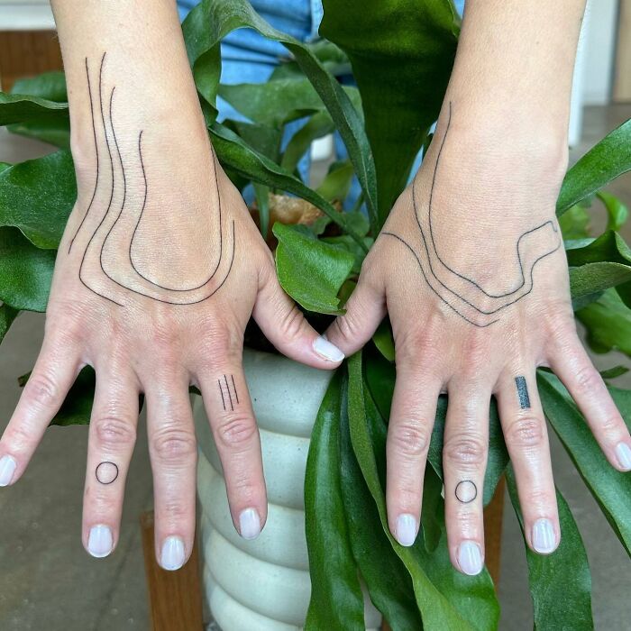 Abstract geometric hand and fingers tattoos