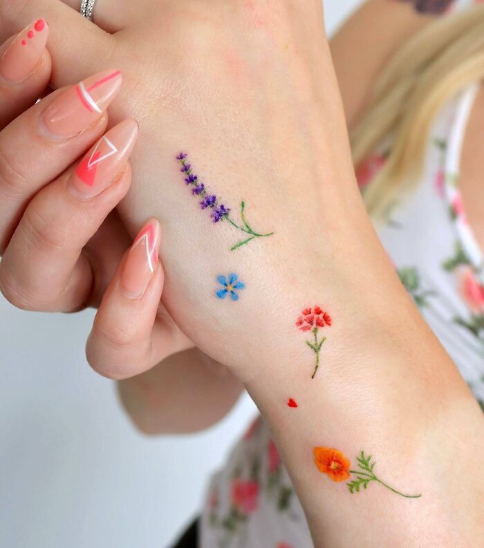 50 Cute Flower Tattoos On Hand  Tattoo Designs  TattoosBagcom