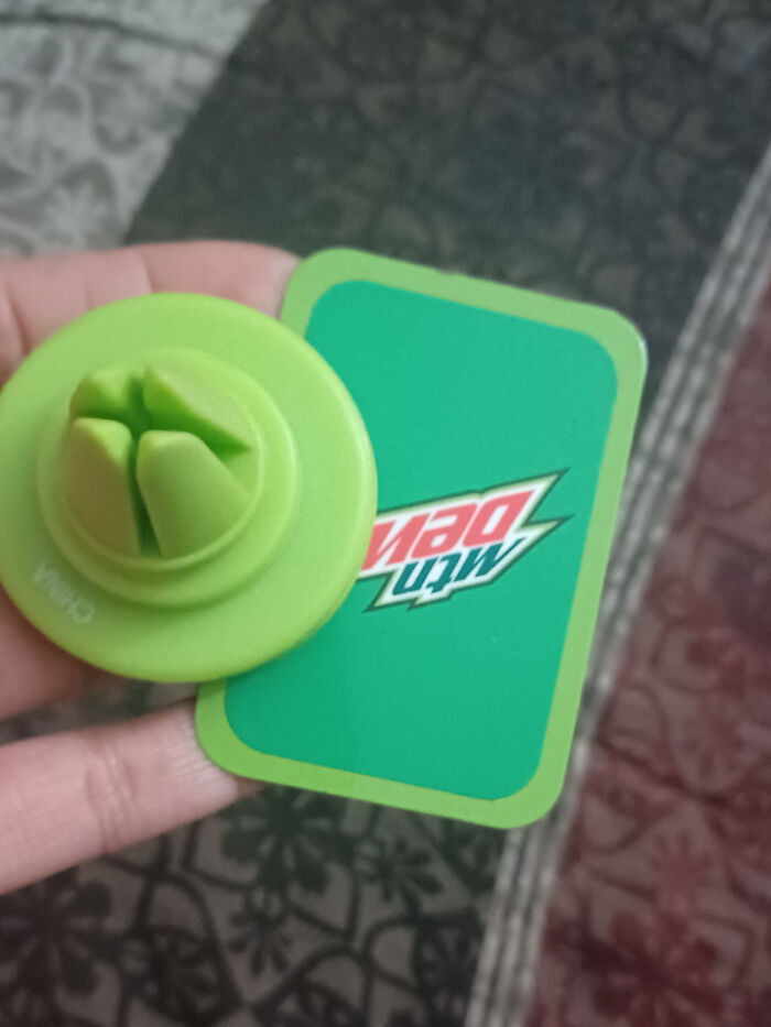 Found This Weird Mountain Dew Thing. It's Magnetic And That's Pretty Much All I Know About It. I Google Image Searched It But Used Nothing But A Lemon Juicer So... What Is It?