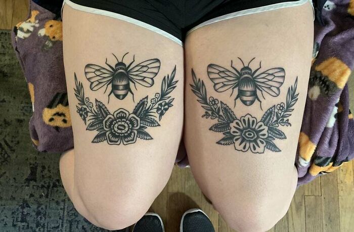 Bees and flowers above both tattoos