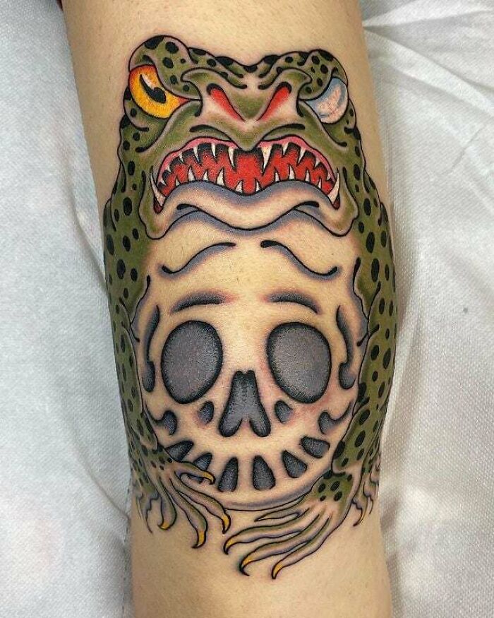 Angry frog with the skull on its' belly tattoo