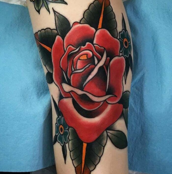 Red rose with leaves tattoo