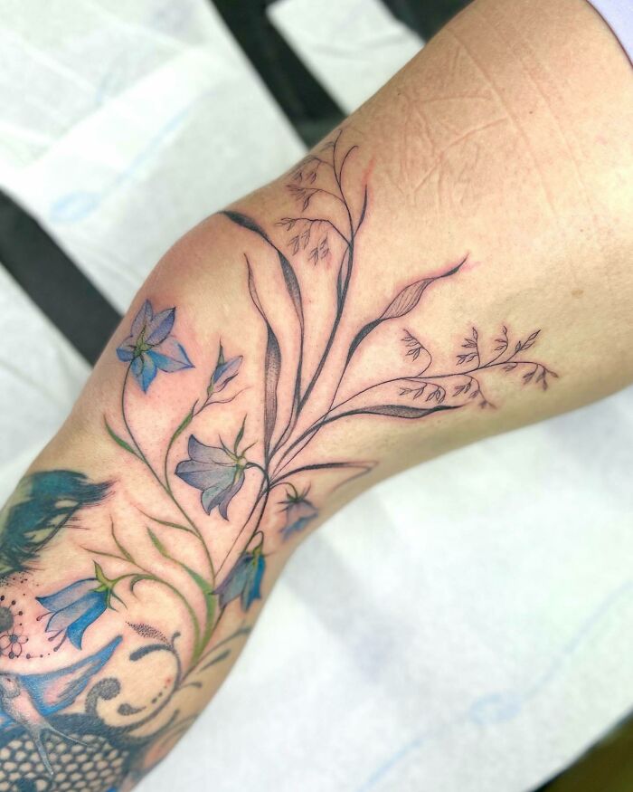 Flowers knee tattoo