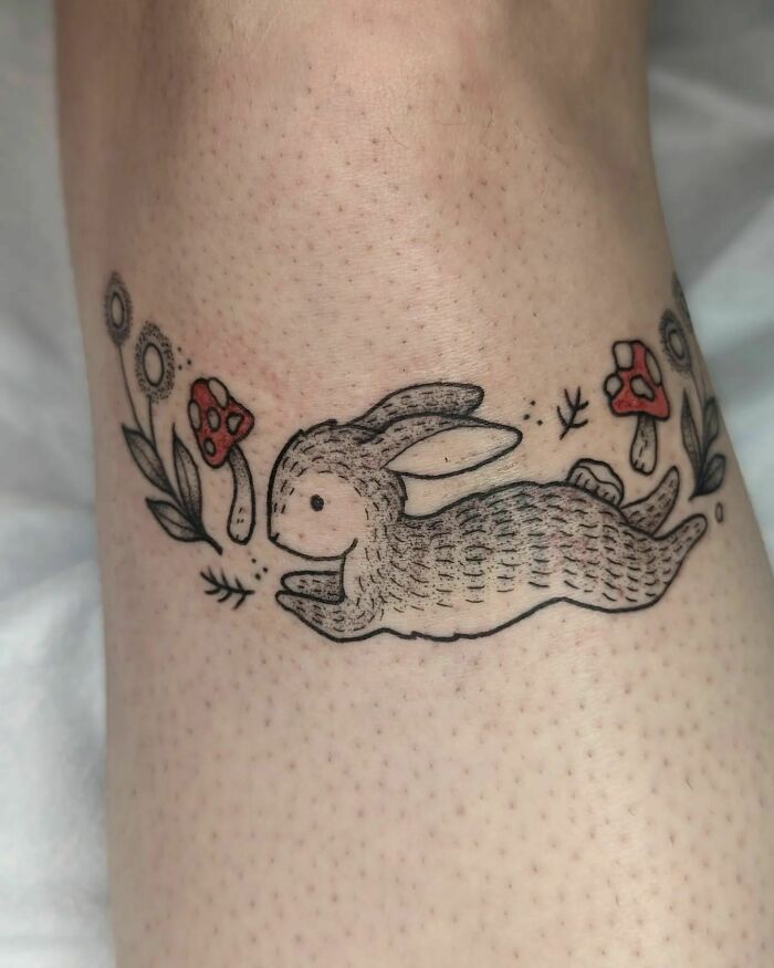 Bunny with flowers and mushrooms tattoo 