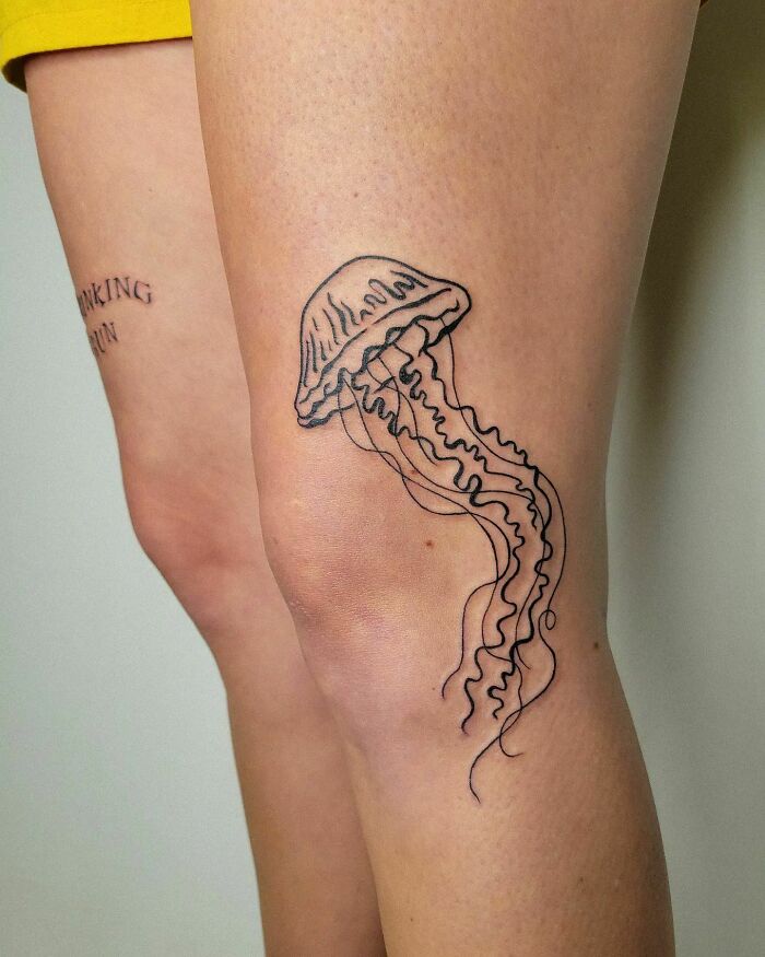 Jelly fish knee tattoo 