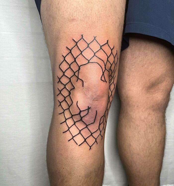 Piece of broken fence tattoo