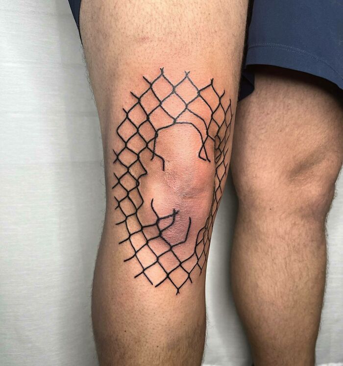 Tattoo design on knee with a mesh pattern, showcasing a unique knee tattoo statement.