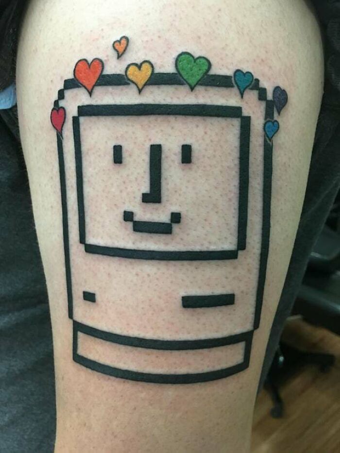 Retro Computer With Rainbow Hearts arm tattoo