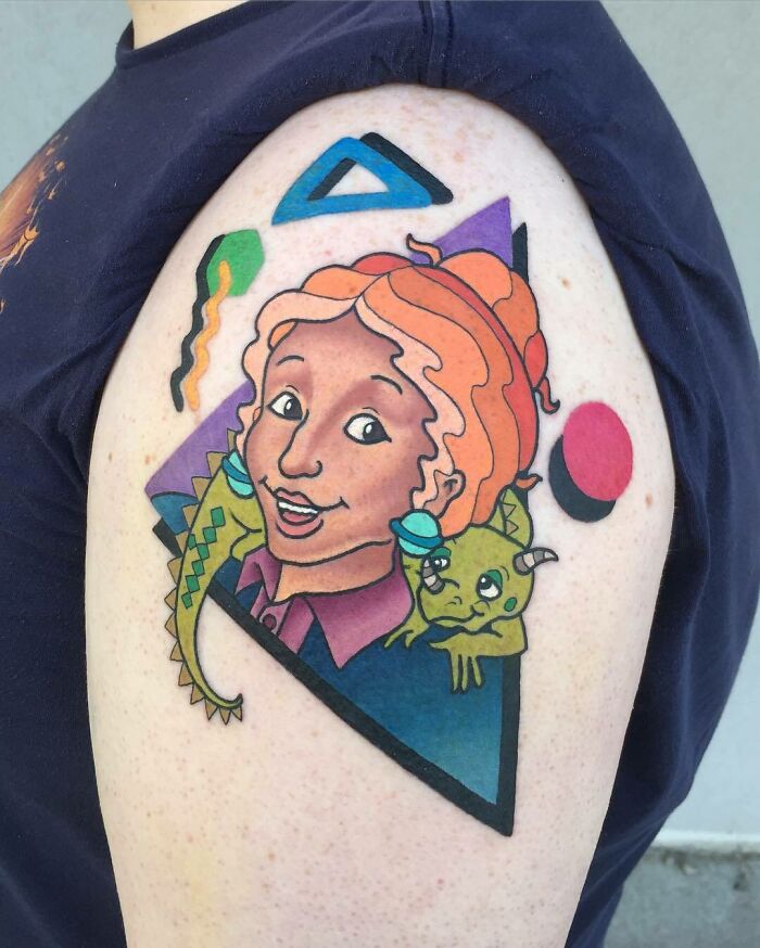 90's cartoon woman smiling with chameleon shoulder Tattoo