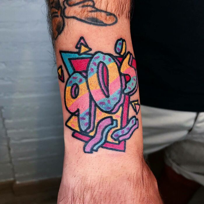 90's colorful arm tattoo