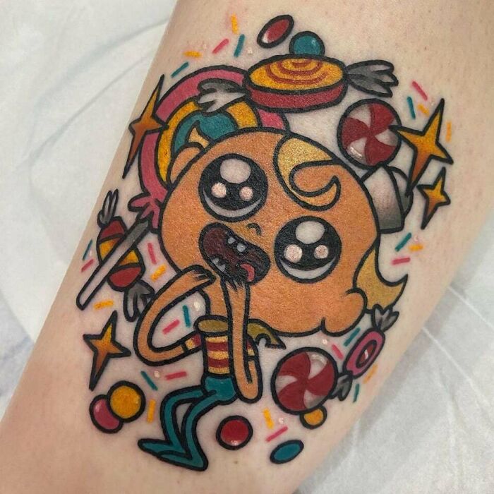 Flapjack smiling with candies cartoon tattoo