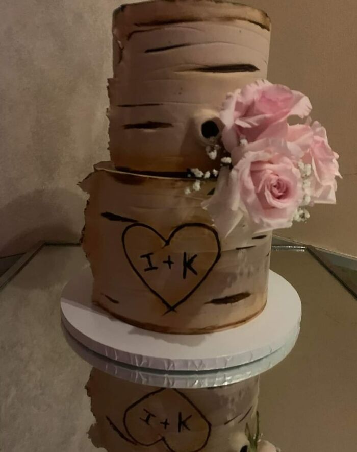 Shaming This Wedding Cake. I Think They're Supposed To Be Logs, But They're Flesh Colored .the Darker Slits On It Give Me The Heebie Jeebies