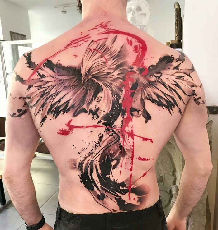 Trash Polka phoenix full back tattoo