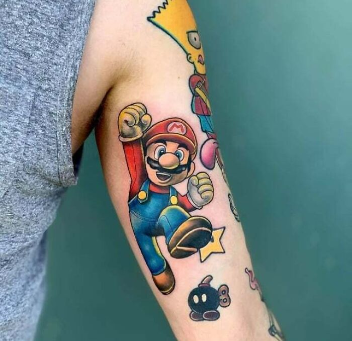 Mario wearing blue and red clothes arm tattoo