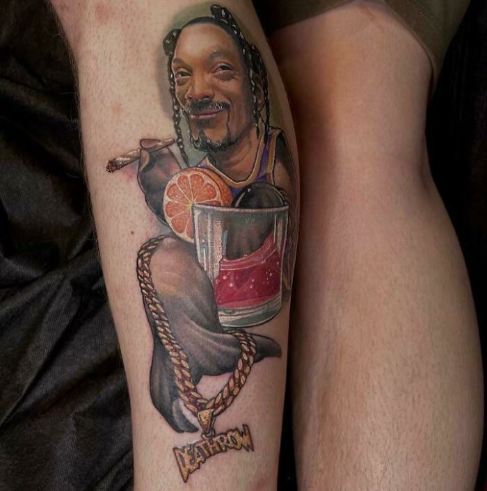 Snoop “Sea” Lion with drink tattoo