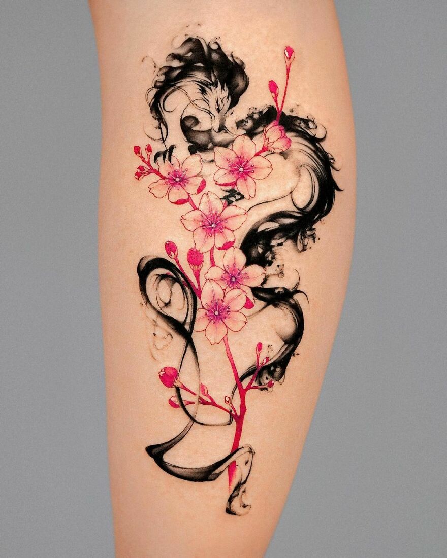 brushstroke style haku dragon tattoo with pink flowers