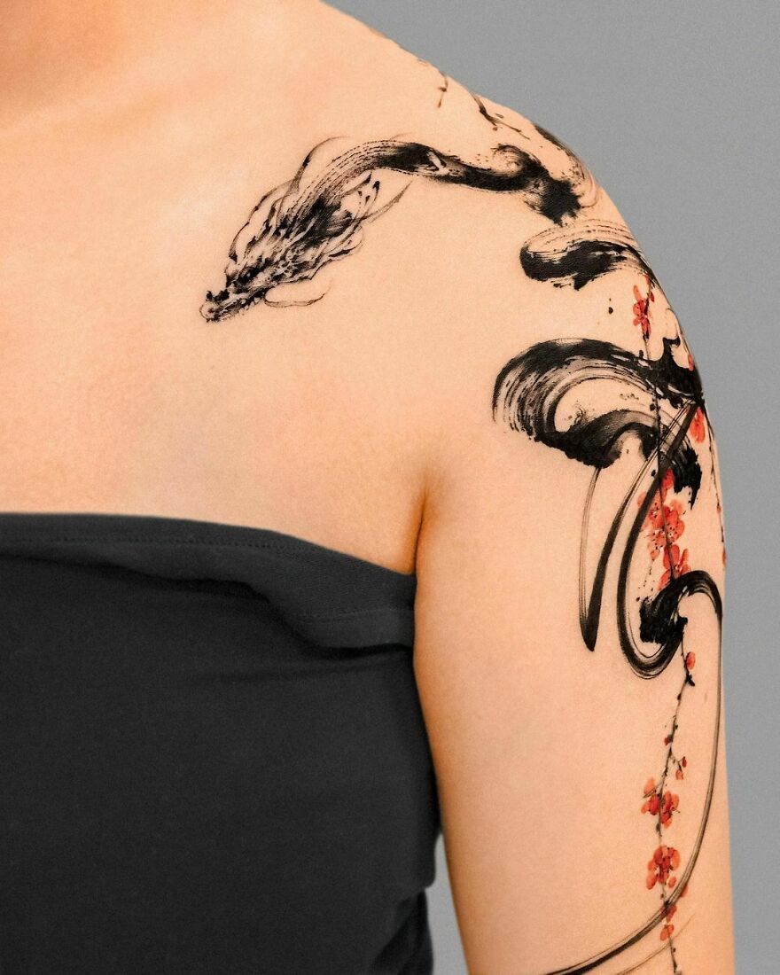 Brushstroke Style Tattoo Of A Dragon On the Shoulder in Black Ink