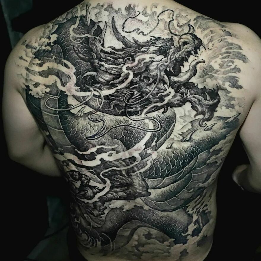 roaring dragon tattoo on back