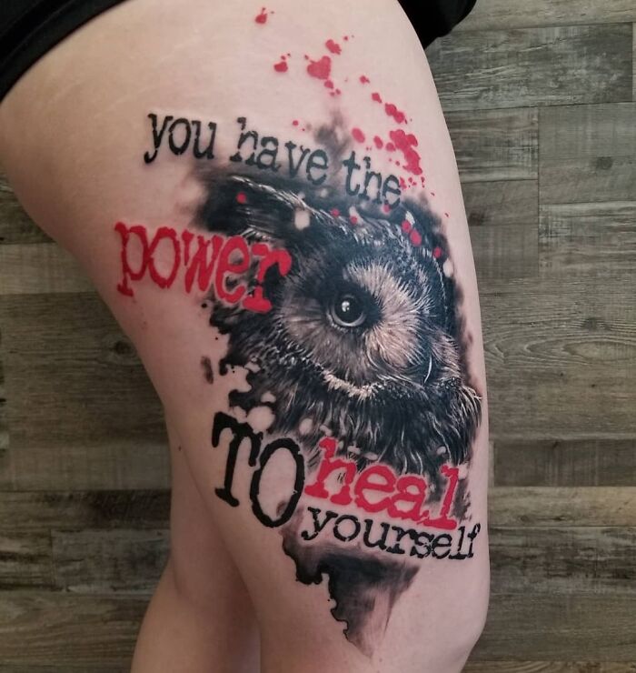 Owl and text tattoo on leg