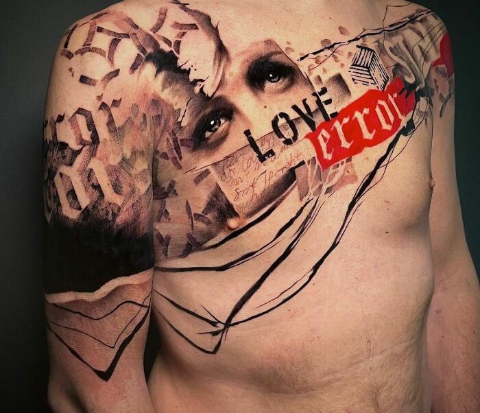 Upper body with intricate Trash Polka tattoo design, featuring eyes, text, and abstract elements.