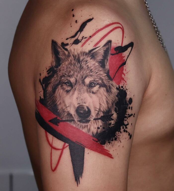 Wolf Trash Polka shoulder tattoo