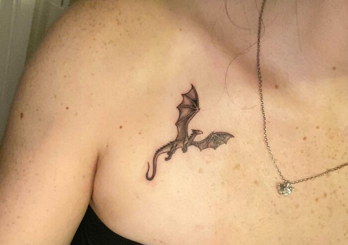 Small Dragon On The Collarbone Tattoo
