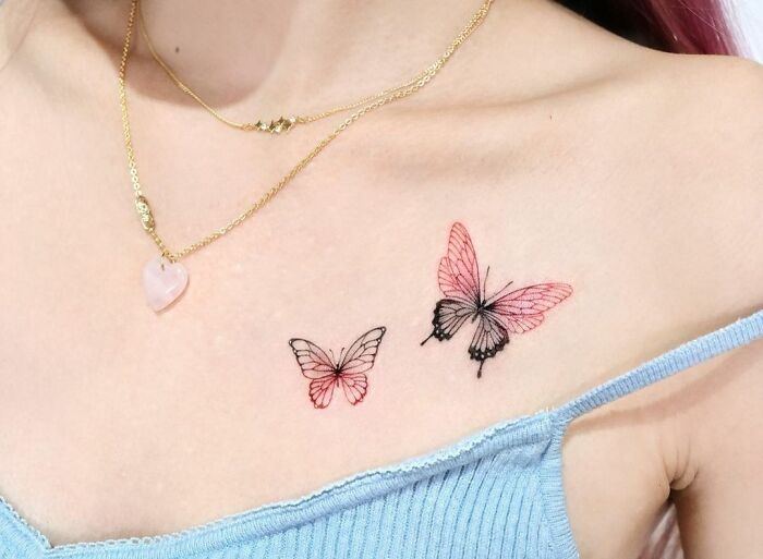 Black And Pink Butterflies Collarbone Tattoo