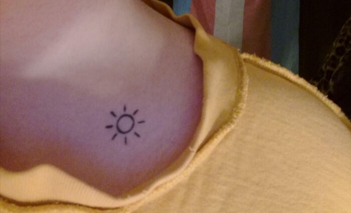 Minimalistic Sun Tattoo