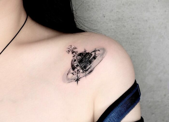 Vivienne Westwood Orb shoulder tattoo